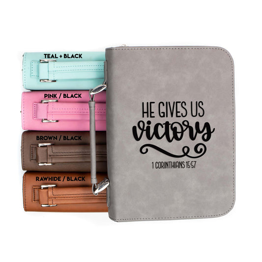 He Gives Us Victory 1 Corinthians 15-57 Bible Cover | Faux Leather With Handle + Pockets